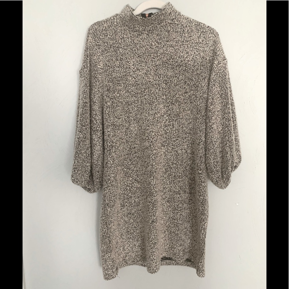 Bubble sleeve mock turtleneck sweater dress.